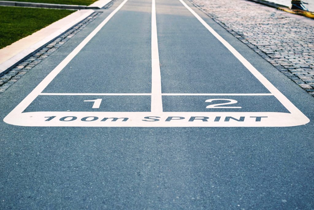 photo of the finish line of 100 meter sprint track